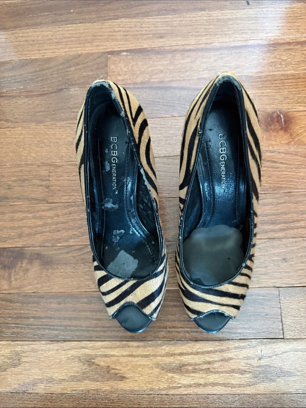 BCBGeneration Zebra-Print Peep-Toe Heels in Tan and Black